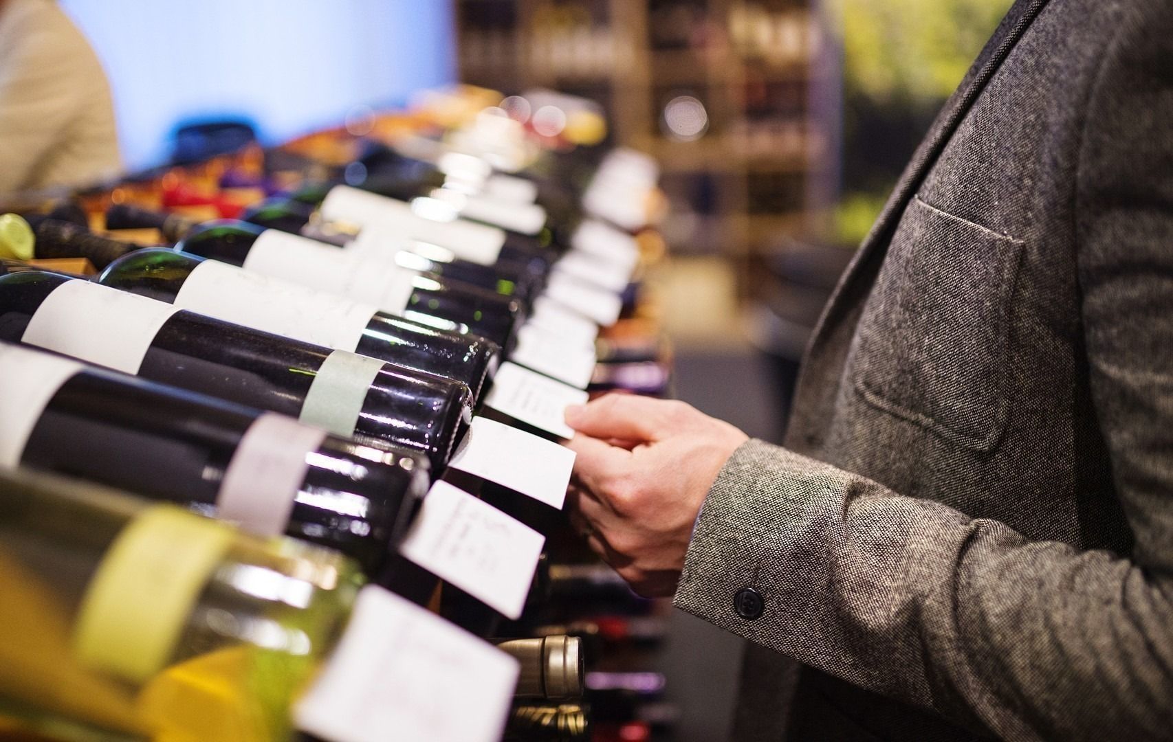 Young man in a wine shop