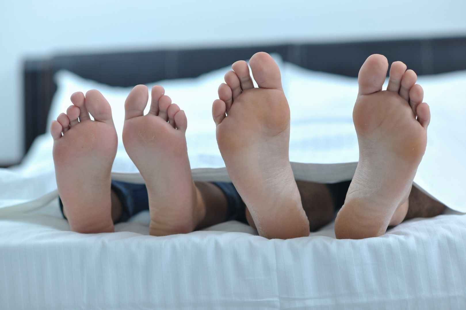 young couple have good time in their bedroom