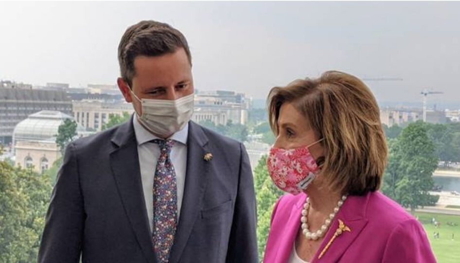 A picture containing person, outdoor, sky, standingDescription automatically generated