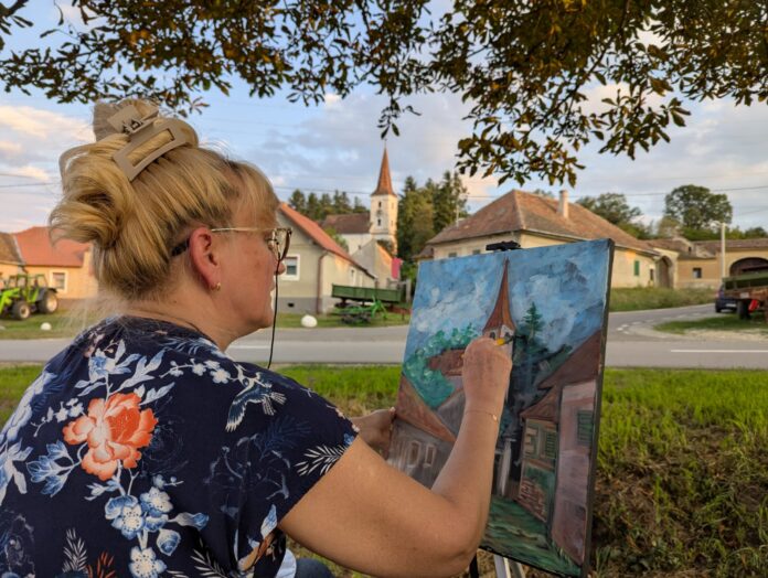 Vedere panoramică a atelierului de pictură în aer liber organizat la Cașolț