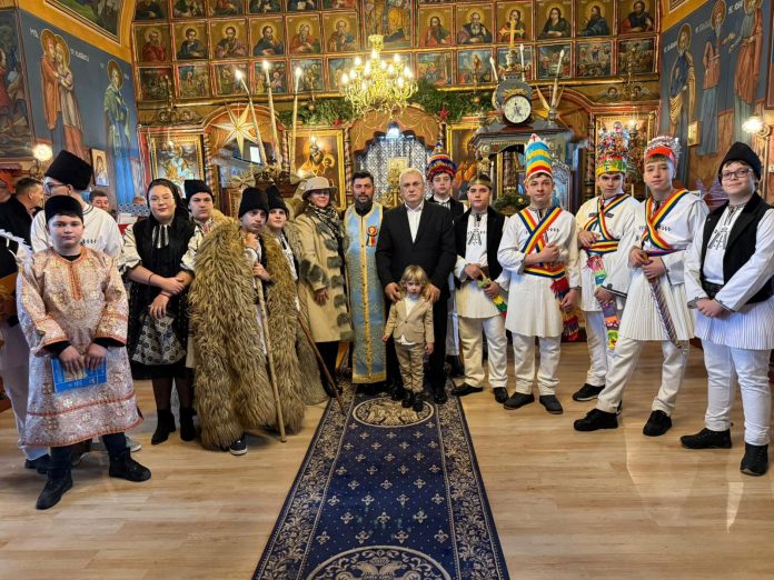Tradiția Irozilor din Boița, cu participanți în costume tradiționale colorate, bucurie și dans.