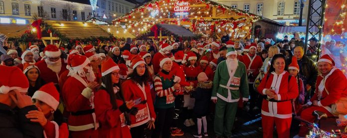 Peste 160 de Moși Crăciun alergând într-un cadru festiv pentru a sprijini Zburătorii, echipa de baschet în scaun rulant