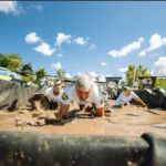 Mulțime de participanți la startul cursei Get Muddy Sibiu pentru donații