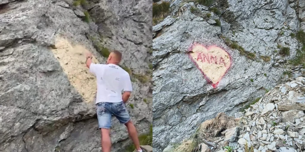 Graffiti sub forma unei inimi cu numele ‘Anna’ pe peretele muntos de pe Transfăgărășan, considerat vandalism.